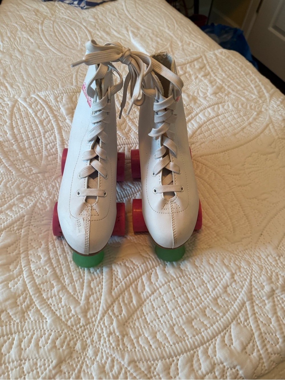 White Girls Quad Roller Skates with Pink and Green Wheels